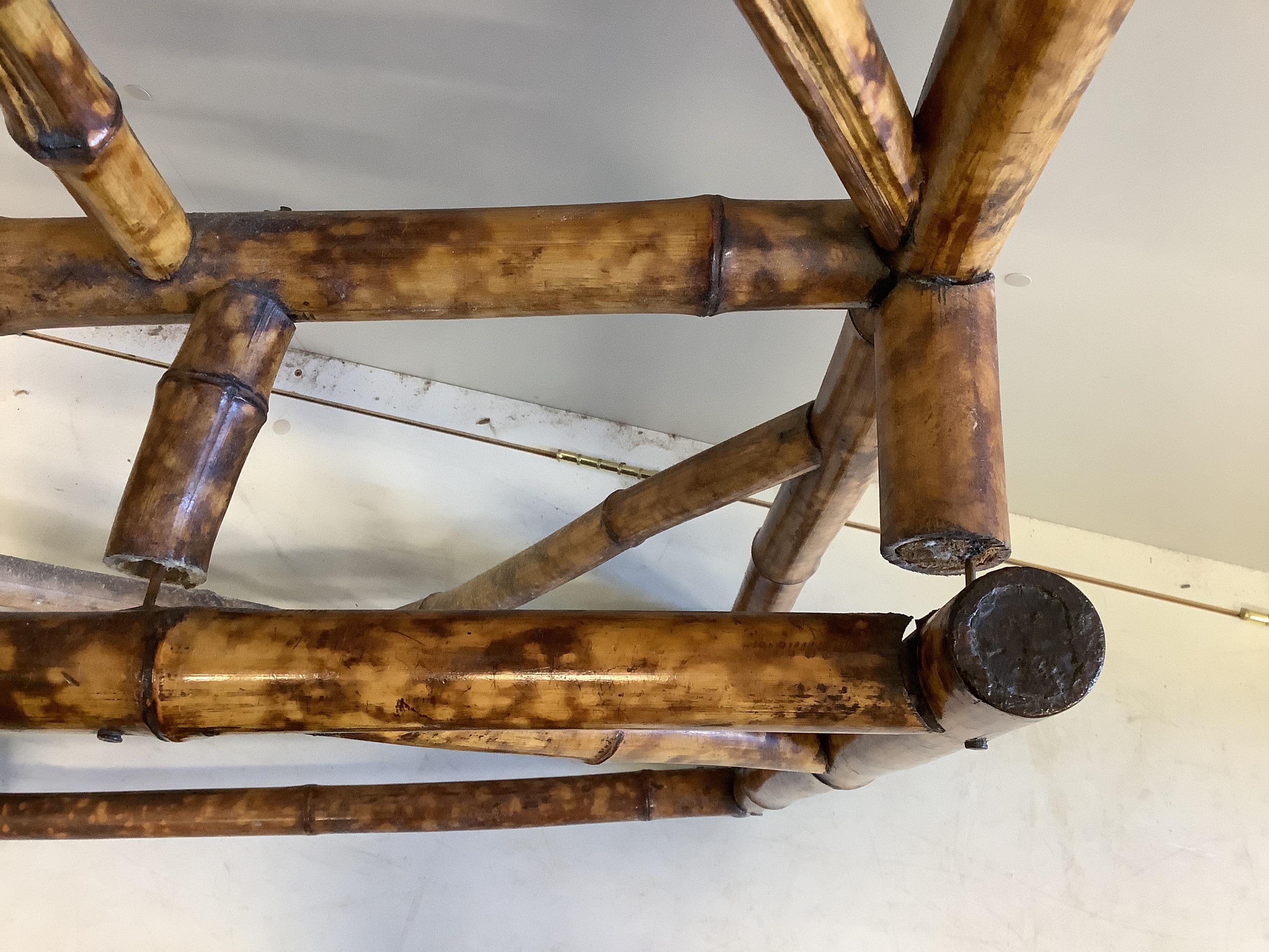 Two late Victorian bamboo hallstands and a bamboo wall mirror, largest width 120cm, height 186cm